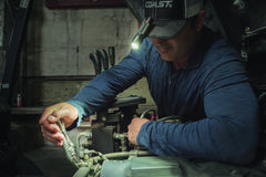 Auto Mechanic Uses Light to Illuminate Working Area, lifestyle photo